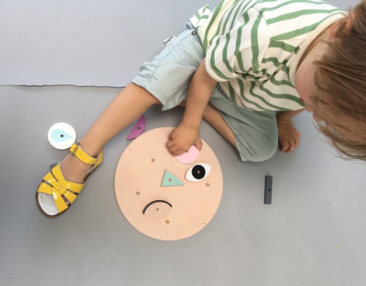 holzlegespiel-kind-makeaface.jpg